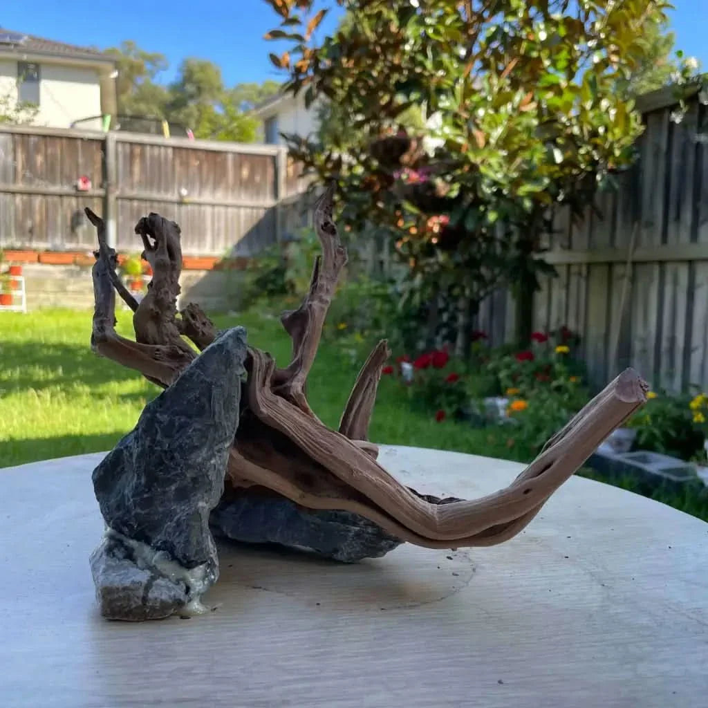 Driftwood and rock sculpture.