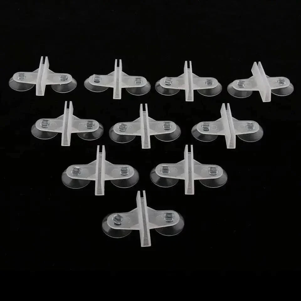 Clear plastic aquarium divider holders.