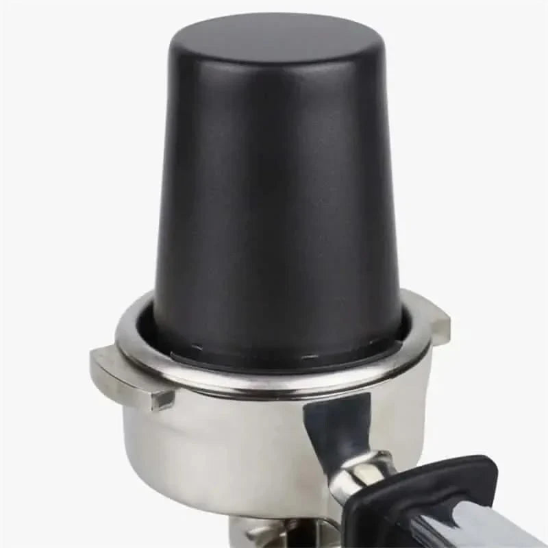 Espresso machine portafilter with dosing funnel.