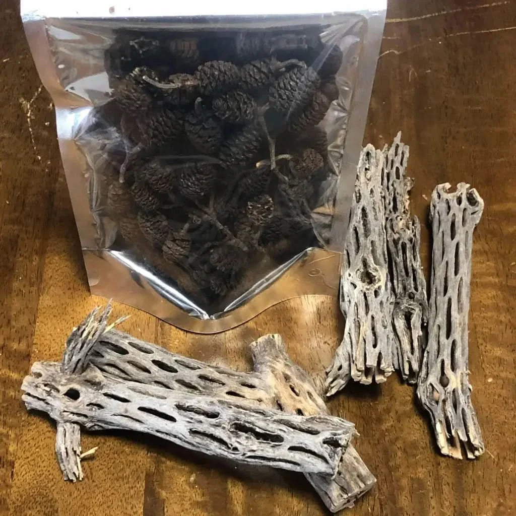 Bagged alder cones and cholla wood.