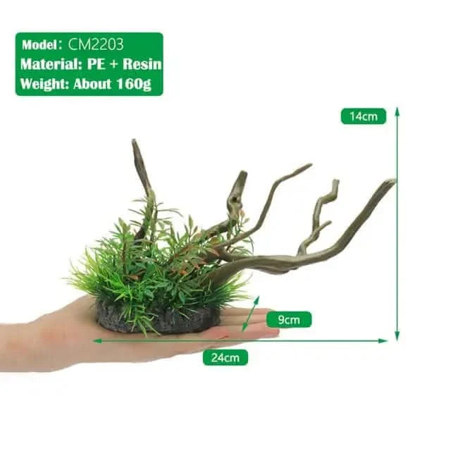Aquarium decoration with driftwood and plants.
