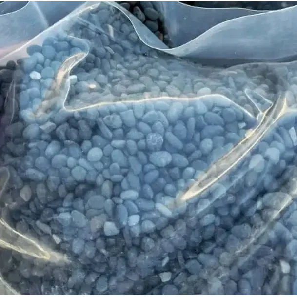 Bag of smooth, gray pebbles.