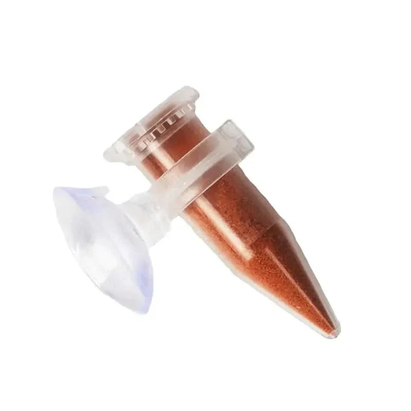 Test tube filled with copper-colored powder.
