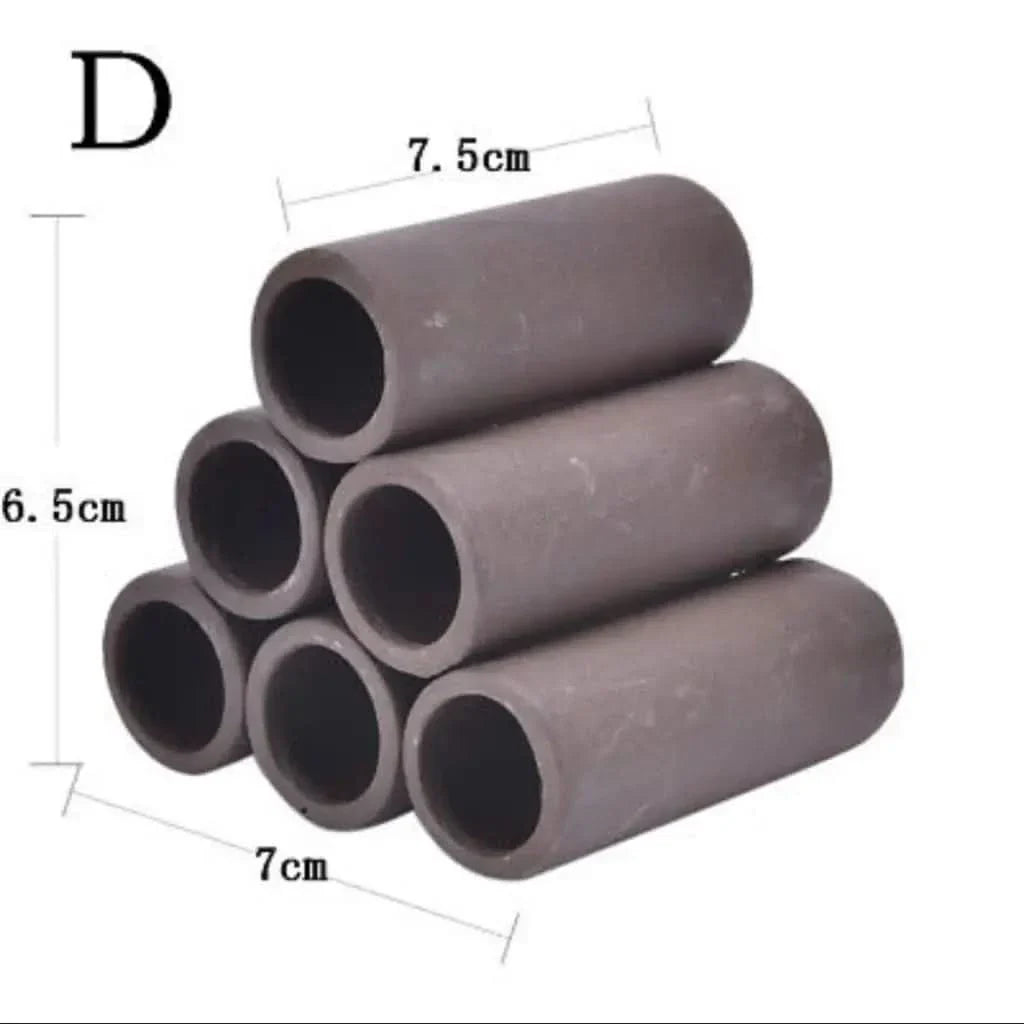 Stacked ceramic aquarium tubes.