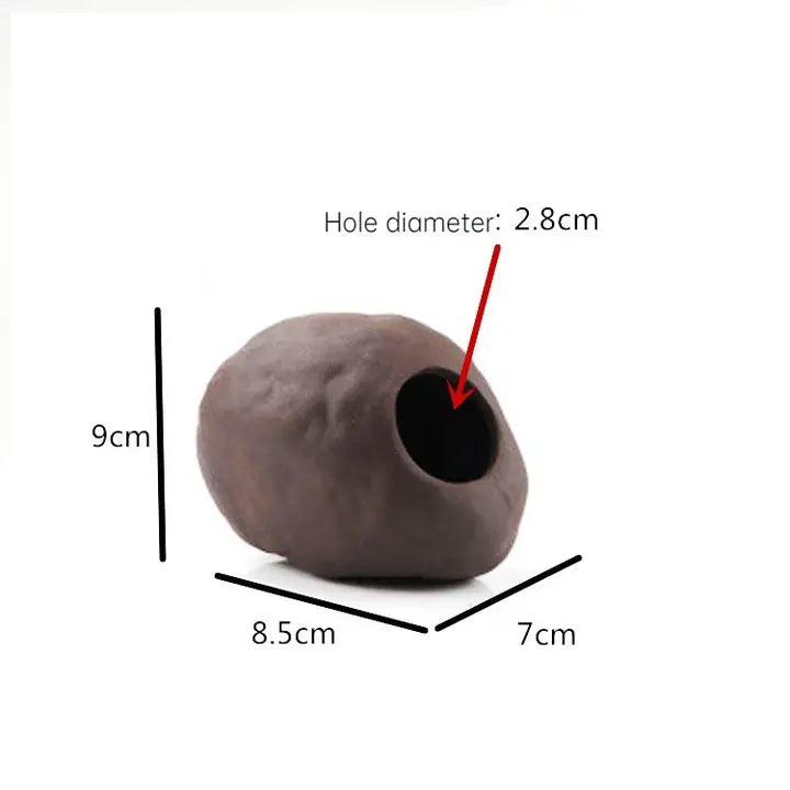 Brown ceramic hideaway with dimensions.