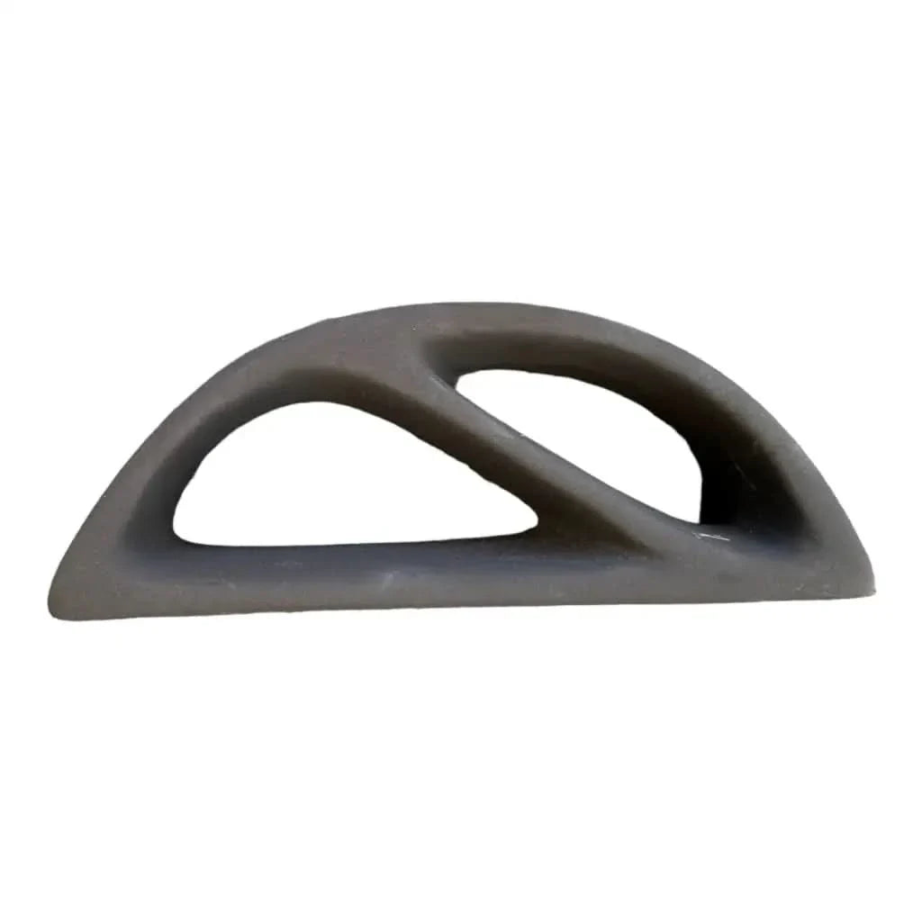 Gray, semi-circular, double-handled object.