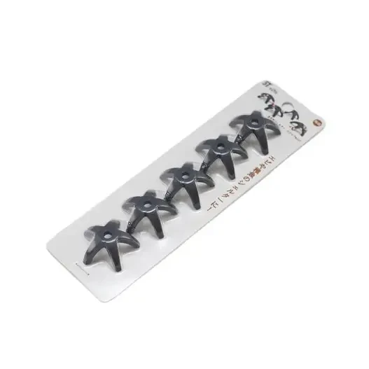 Five black, star-shaped, plastic hooks on a white card.