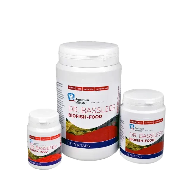 Three containers of fish food.
