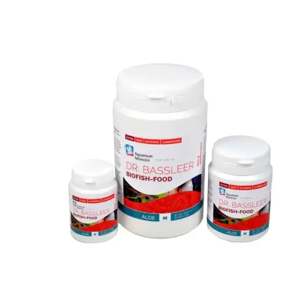 Three white containers of fish food.