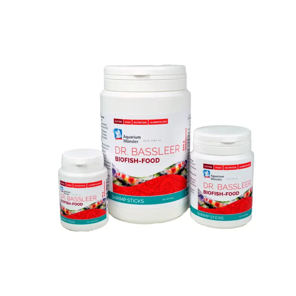 Three containers of fish food.
