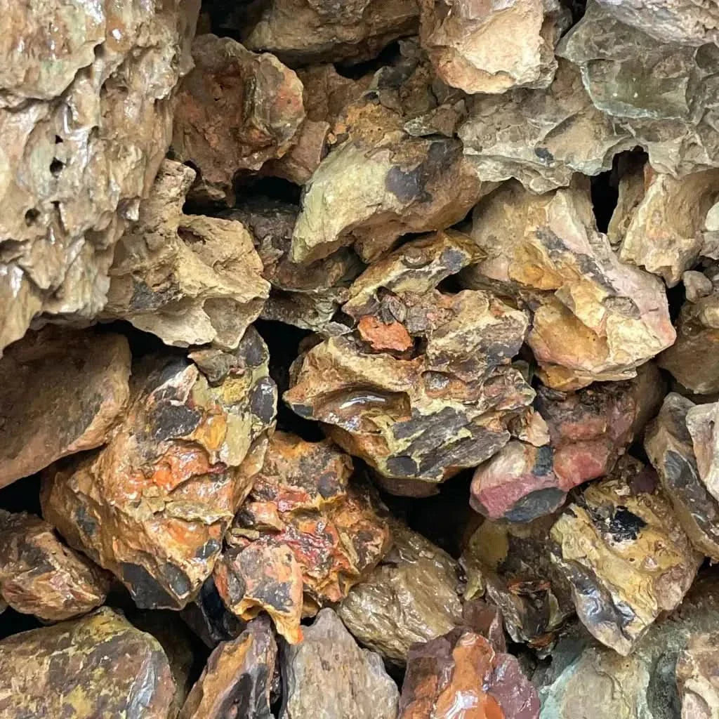 Pile of rough, multicolored rocks.