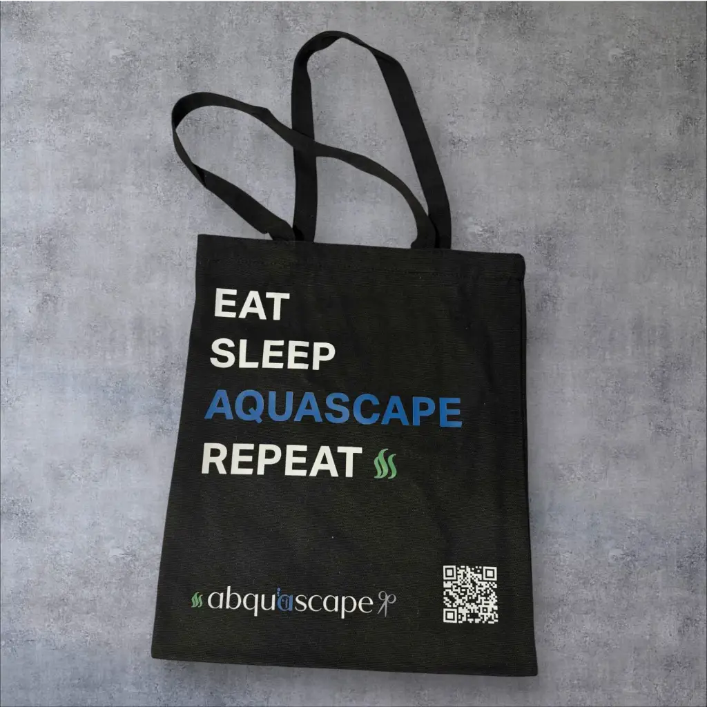 Black tote bag with handles.