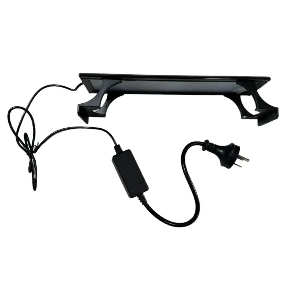 Black aquarium light with power adapter.