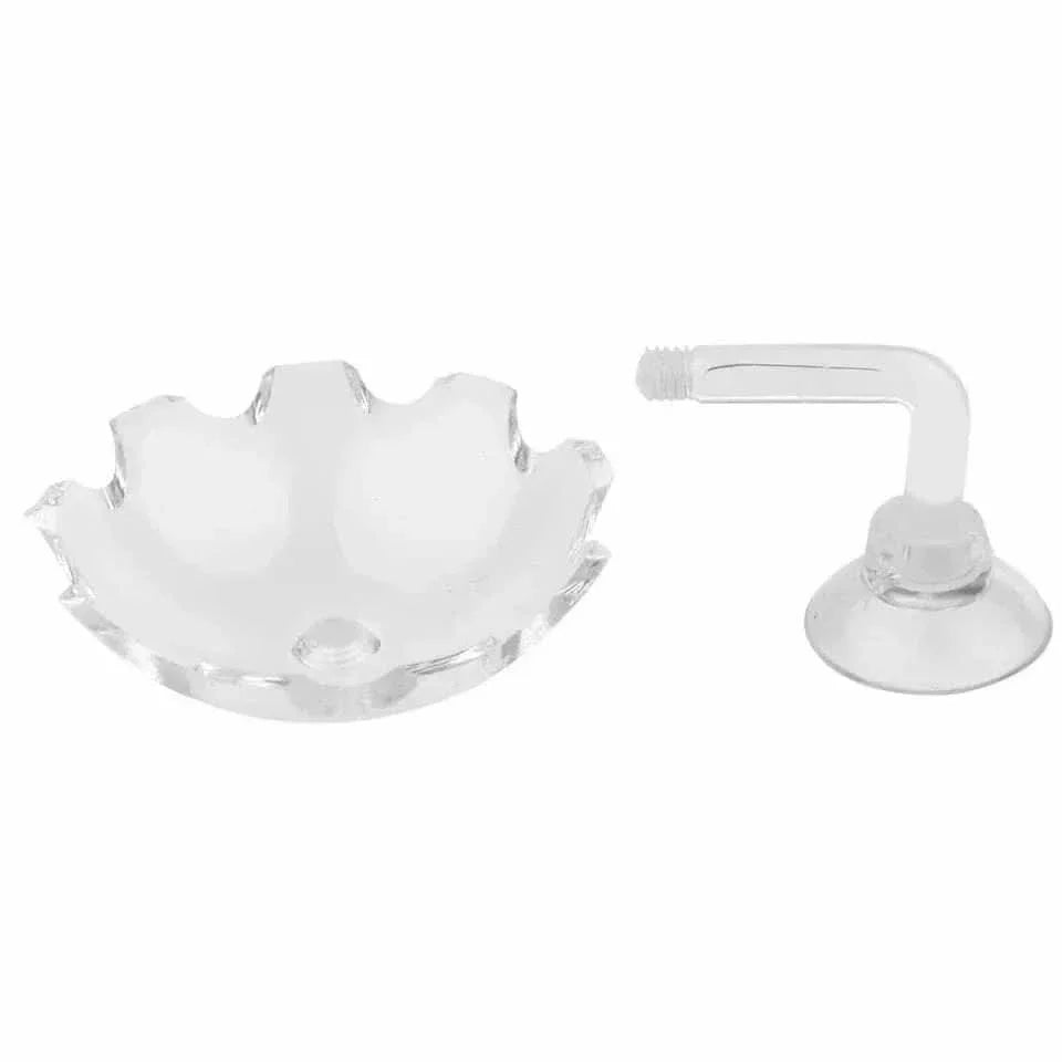 Clear glass soap dish and suction cup holder.