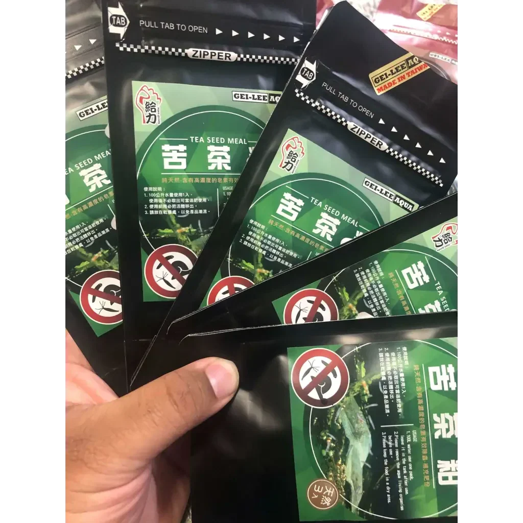 Packets of tea seed meal.