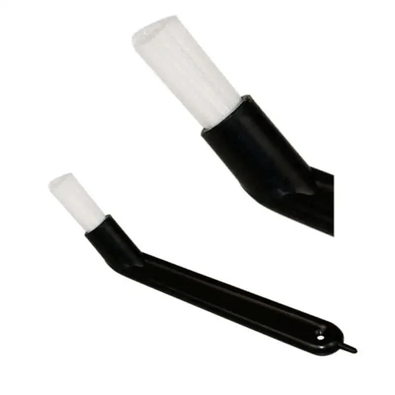 Black espresso machine cleaning brush.