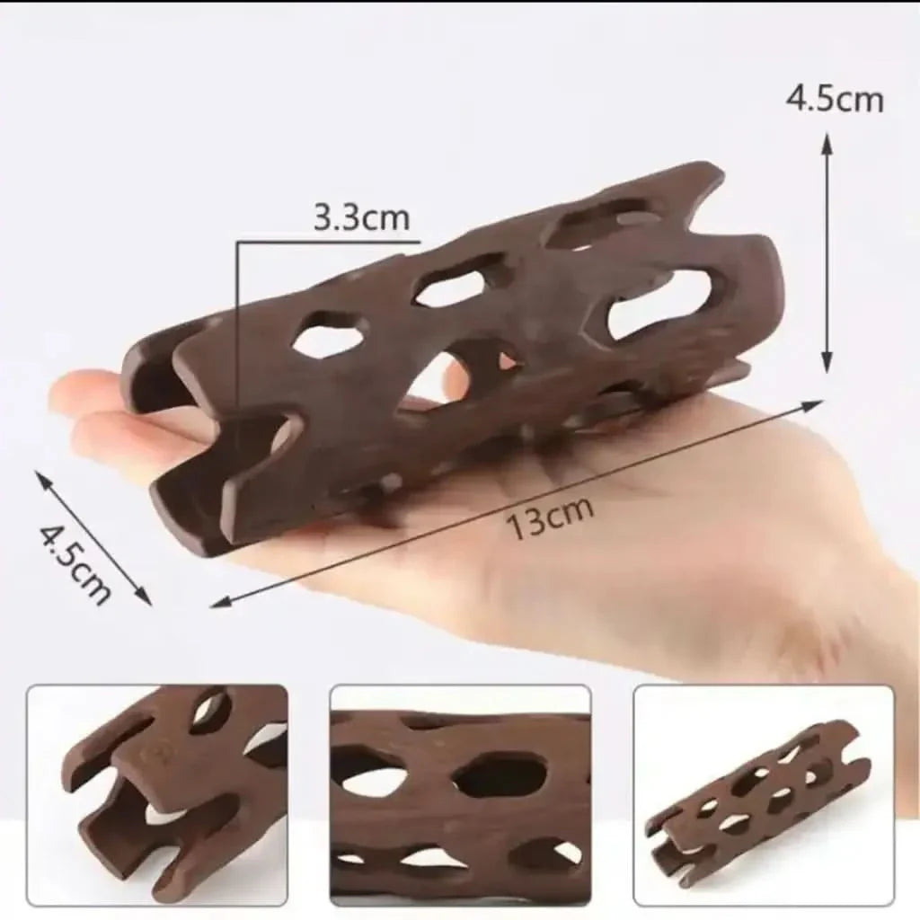 Brown ceramic aquarium decoration with holes.