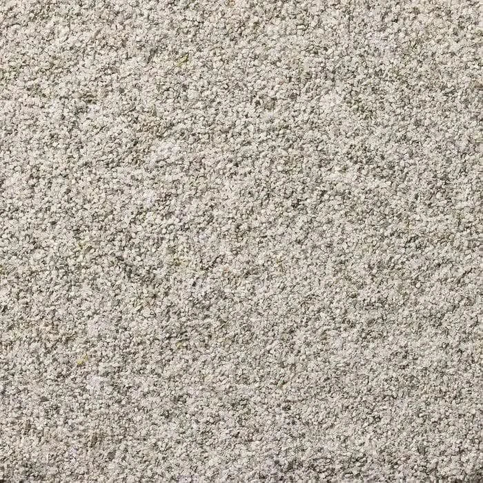 Granular, light gray surface.