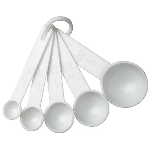 White plastic measuring spoons.
