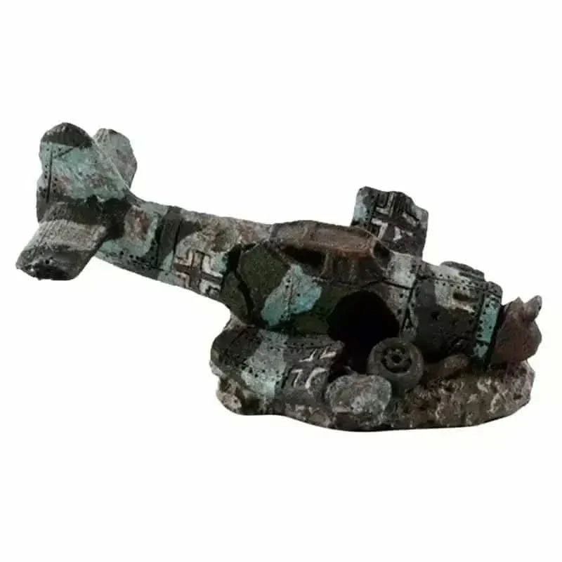 Camouflaged, wrecked airplane model.