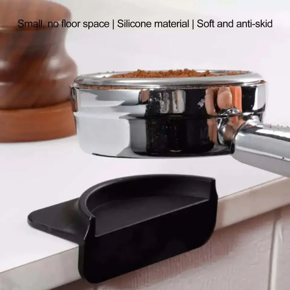 Espresso portafilter and tamping station.