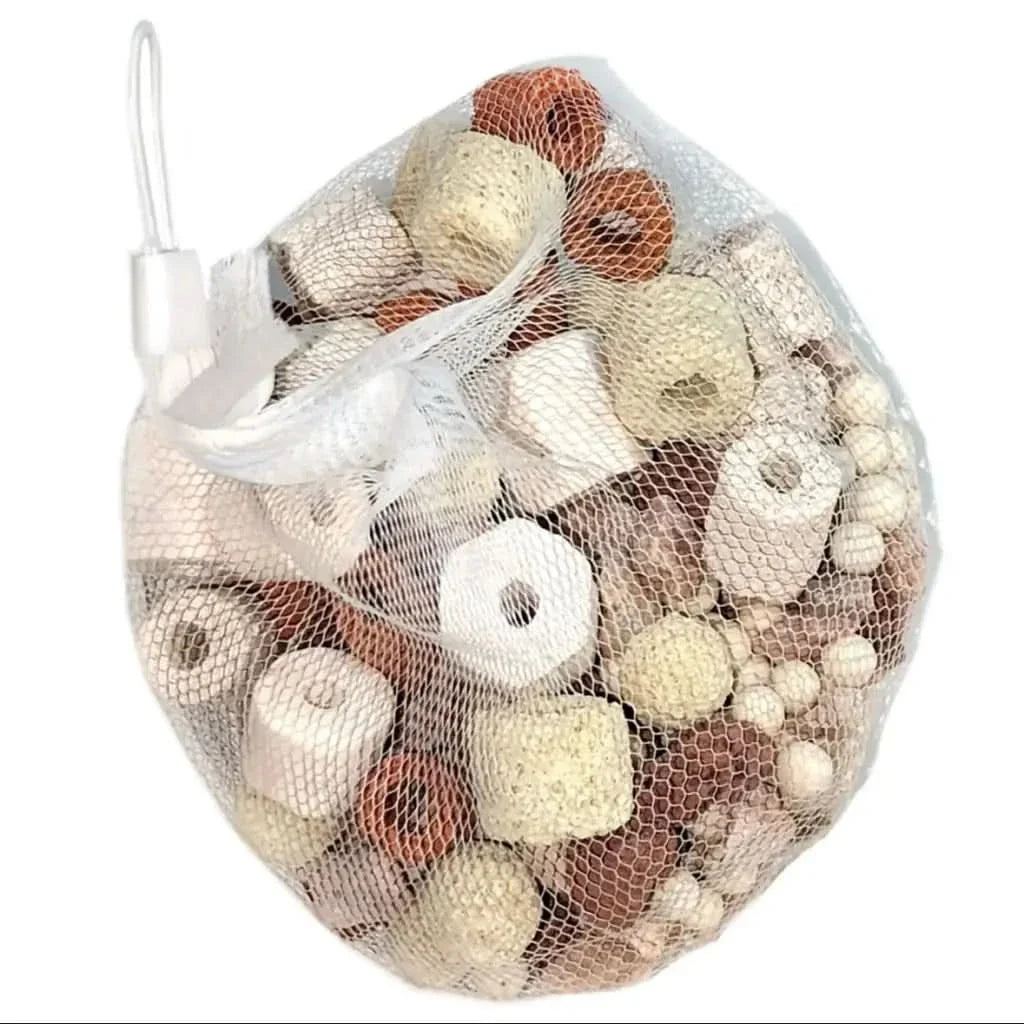 Mesh bag of ceramic filter media.