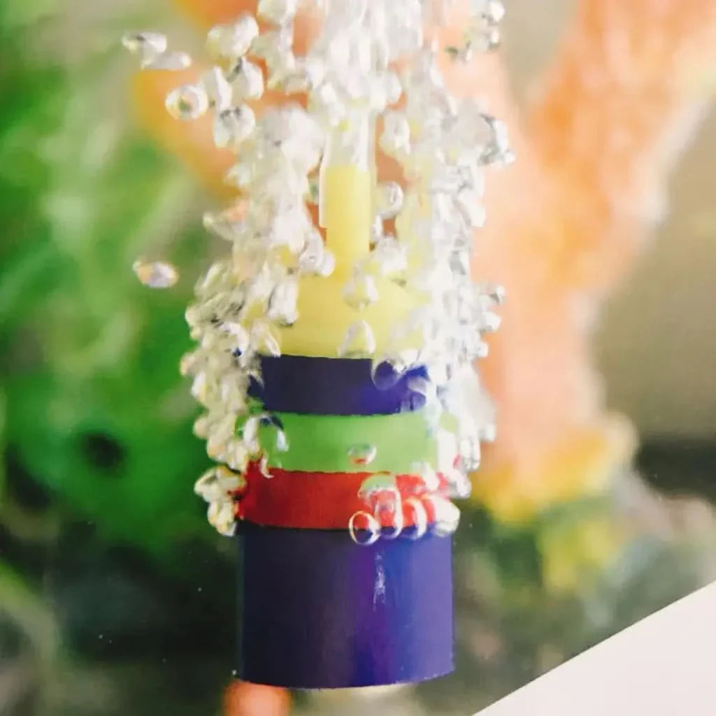 Colorful aquarium air stone with bubbles.