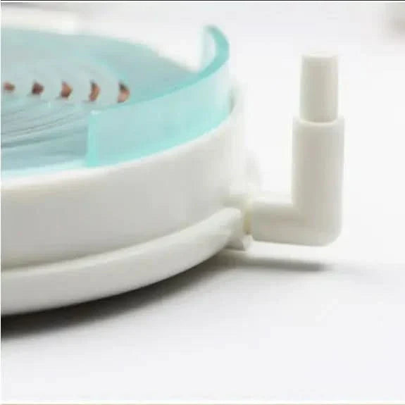 White plastic dental impression tray.