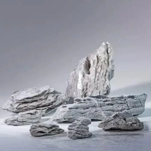 Collection of gray, layered rocks.