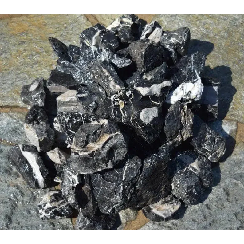 Pile of black and white rocks.