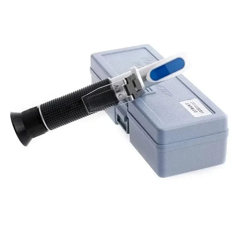 Handheld refractometer with case.