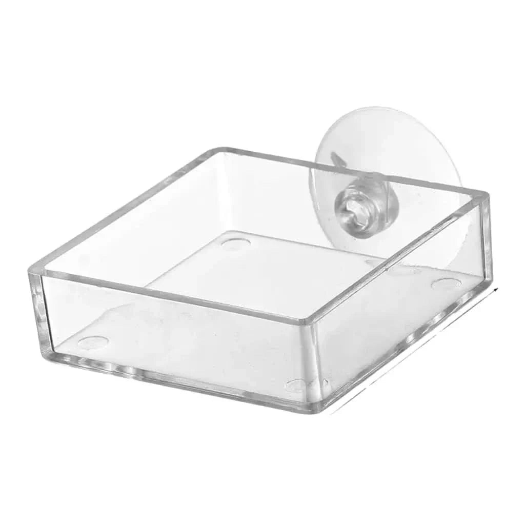 Clear acrylic feeding dish with suction cup.