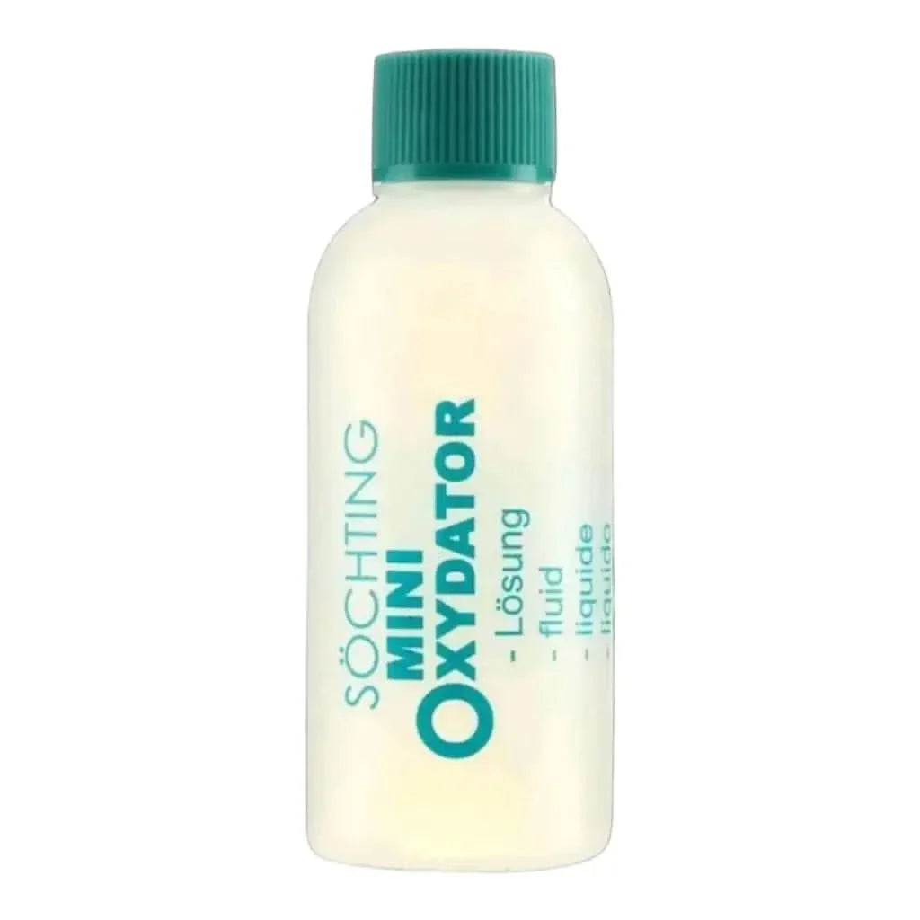 Bottle of clear liquid with a green cap.