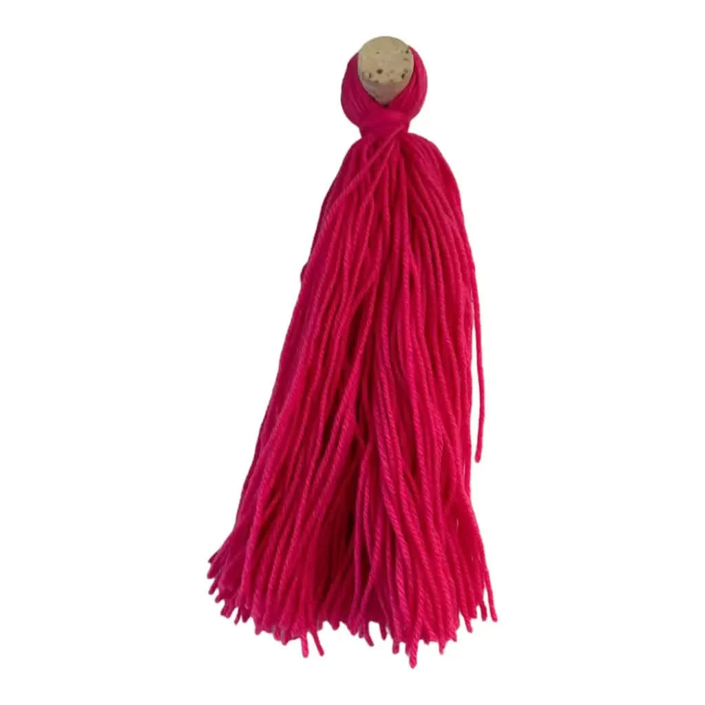 Fuchsia yarn tassel with wooden bead.