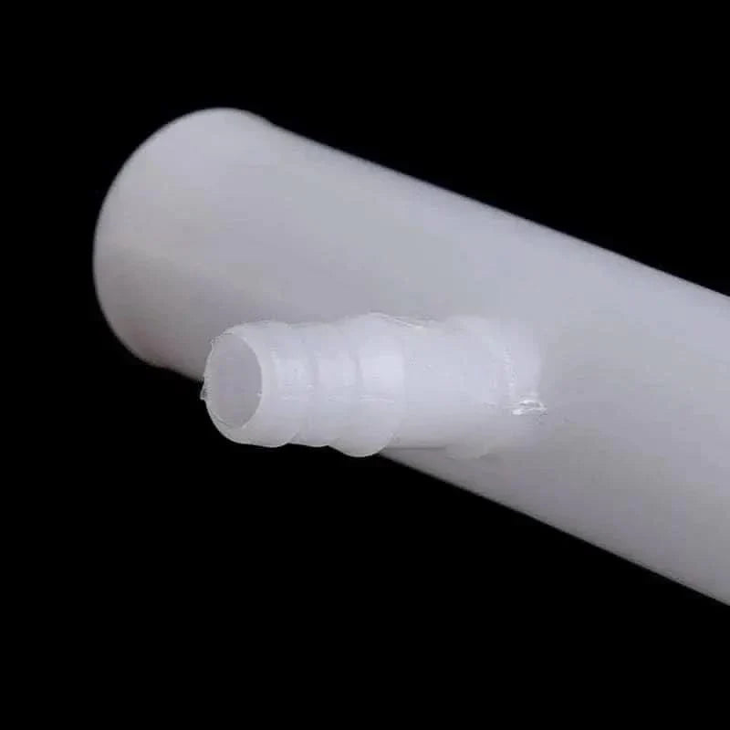 White plastic barbed hose connector.