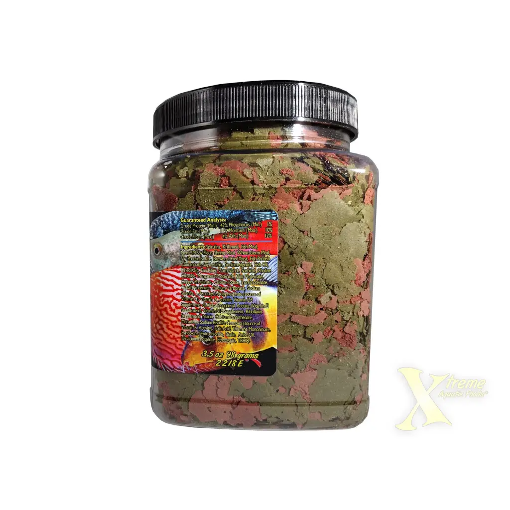 Container of fish food flakes.