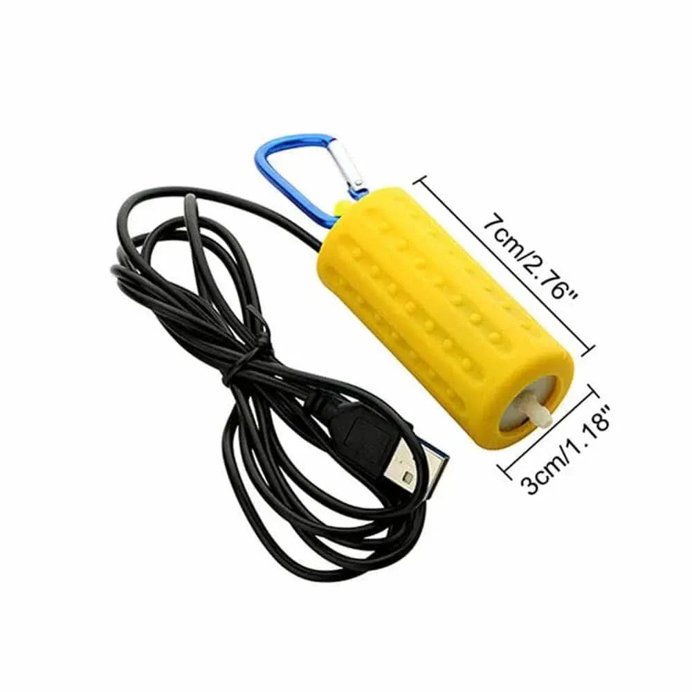 Yellow USB air pump with blue carabiner.