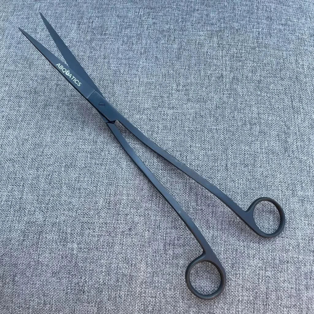 Long, black, metal scissors.