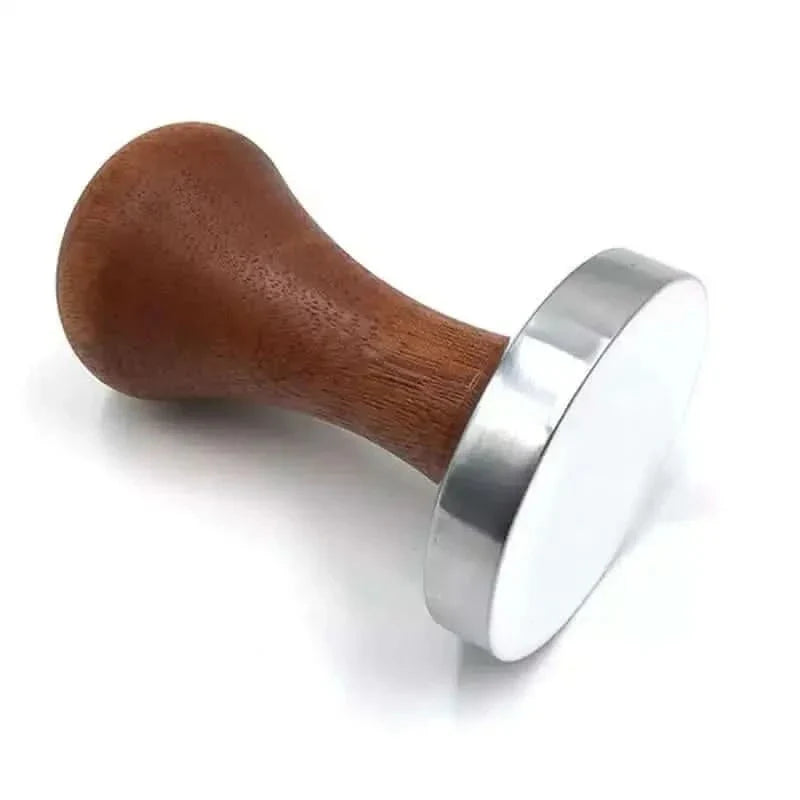Espresso tamper with wooden handle and metal base.