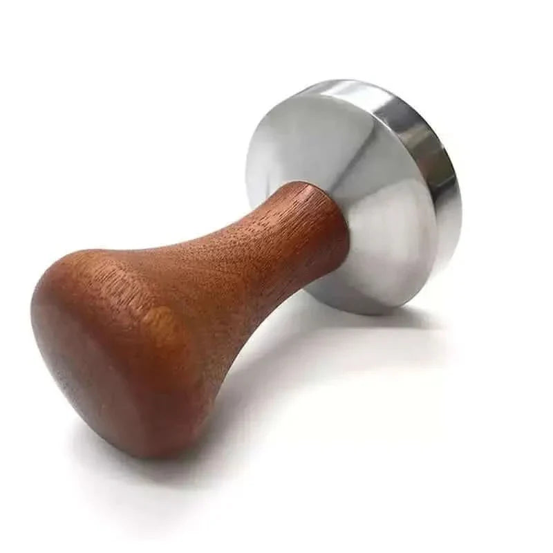 Coffee tamper with wooden handle and metal base.