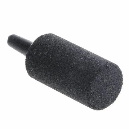 Cylindrical black porous air stone.