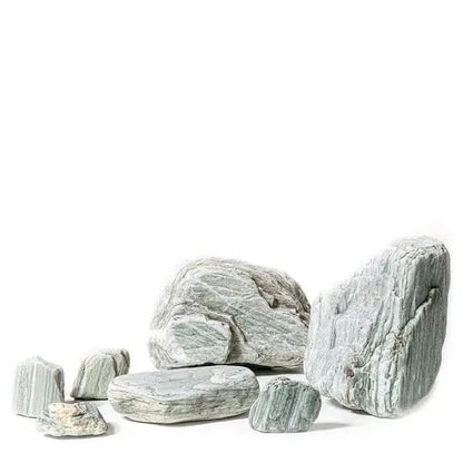 Collection of striated gray rocks.