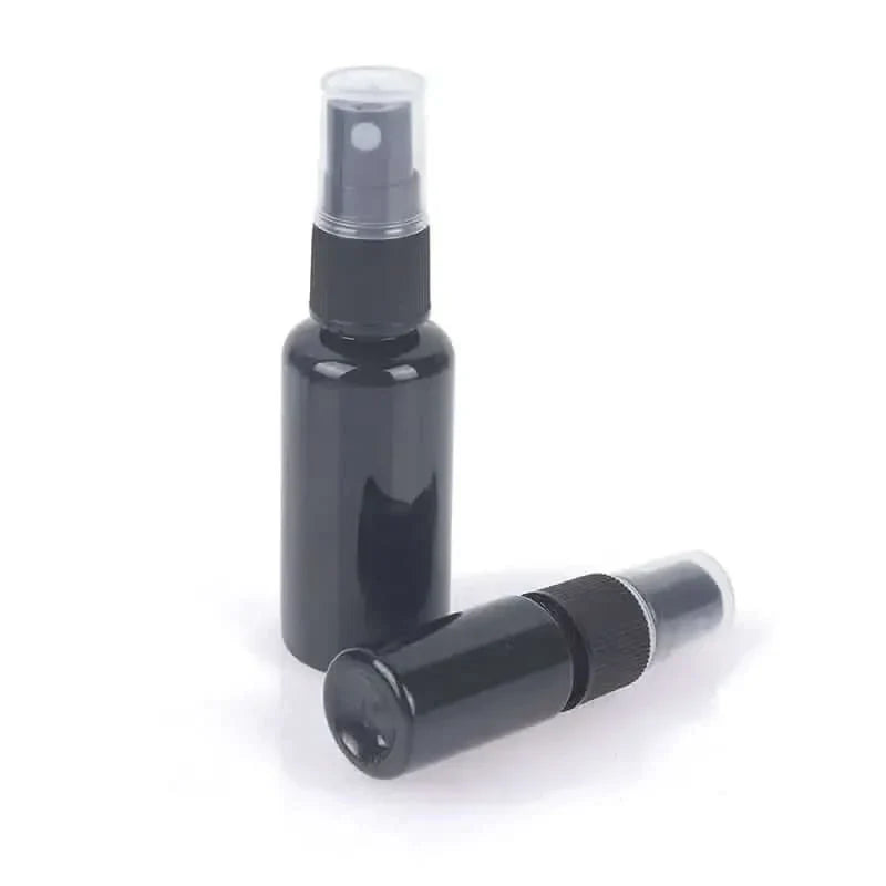 Two black spray bottles.