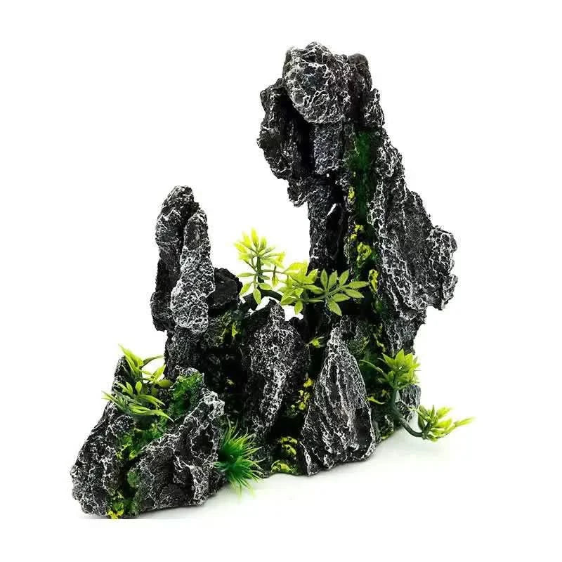Artificial rock formation with green plants.