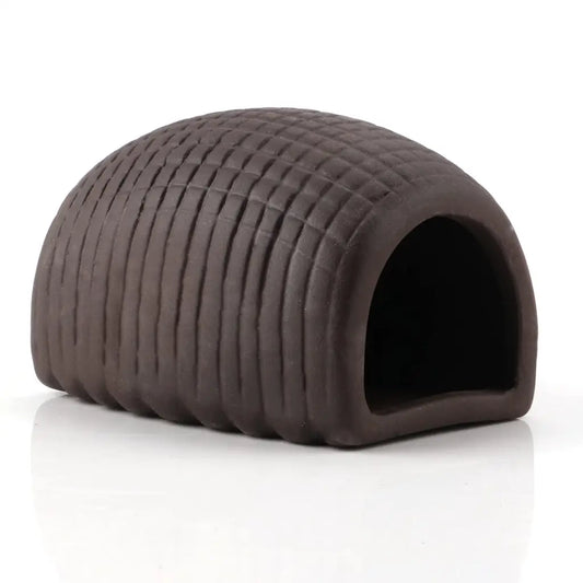 Brown ceramic reptile hide.