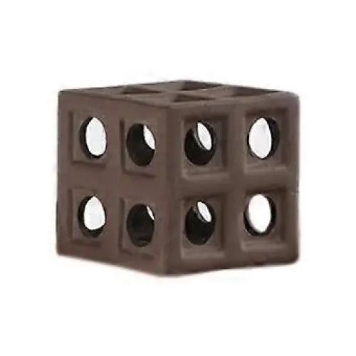 Brown cube with circular openings.