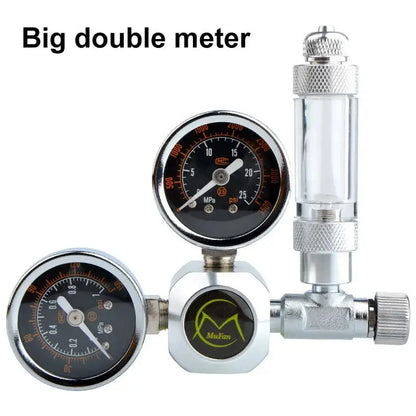 Dual gauge pressure regulator with flow meter.