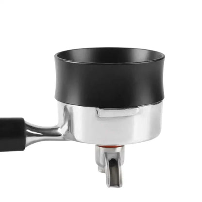 Espresso machine portafilter with black collar.