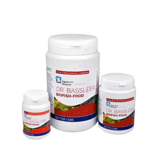 Three containers of fish food.
