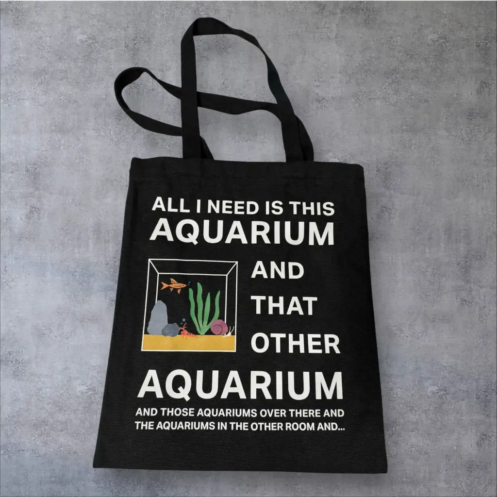 Black tote bag with an aquarium-themed graphic.